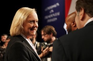 Meg Whitman speaks with guests before the start of the third U.S. presidential debate in Las Vegas on Oct. 19, 2016. (Credit: Chip Somodevilla/Getty Images)