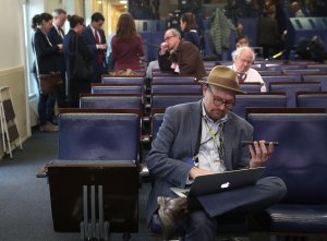 New York Times reporter Glenn Thrush works in the Brady Briefing Room after being excluded from a press gaggle by White House Press Secretary Sean Spicer, on February 24, 2017 in Washington, DC. (Credit: Mark Wilson/Getty Images)