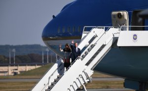 U.S. President Donald Trump and First Lady Melania Trump wave upon arriving at U.S. Yokota Air Base in Tokyo on Nov. 4, 2017. (Credit: Toshifumi Kitamura / AFP / Getty Images)