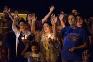 A candlelight vigil is observed on Nov. 5, 2017, following the mass shooting at the First Baptist Church in Sutherland Springs, Texas, that left at least 26 people dead. (Credit: Suzanne Cordeiro / AFP / Getty Images)