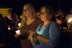 A candlelight vigil is observed on Nov. 5, 2017, following the mass shooting at the First Baptist Church in Sutherland Springs, Texas, that left 26 people dead. (Credit: Suzanne Cordeiro / AFP / Getty Images)