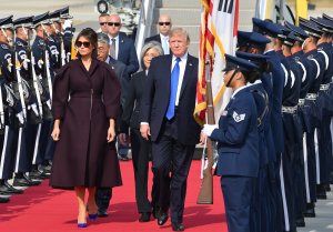 President Donald Trump and first lady Melania Trump arrive at the Osan Air Base in Pyeongtaek, south of Seoul on November 7, 2017. (Credit: SONG KYUNG-SEOK/AFP/Getty Images)