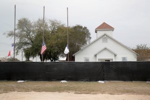 A tarp is wrapped around the First Baptist Church of Sutherland Springs as law enforcement officials wrap up their investigation into the shooting on Nov. 9, 2017, in Sutherland Springs, Texas. (Credit: Scott Olson/Getty Images)