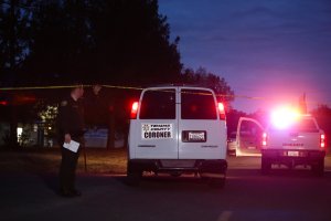A Tehama County coroner's van enters the Rancho Tehama Elementary school grounds after a shooting on November 14, 2017, in Rancho Tehama. (Credit: ELIJAH NOUVELAGE/AFP/Getty Images)