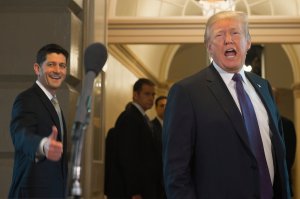 U.S. President Donald Trump leaves alongside Speaker of the House Paul Ryan after meeting with the House Republicans about tax reform at the Capitol, Nov. 16, 2017. (Credit: SAUL LOEB / AFP / Getty Images)