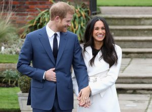 Prince Harry and Meghan Markle pose for photos to announce their engagement at Kensington Palace in London on Nov. 27, 2017. (Credit: Chris Jackson / Getty Images)