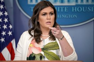 White House Press Secretary Sarah Huckabee Sanders talks with reporters during the daily news conference in the Brady Press Briefing Room at the White House November 27, 2017 in Washington, DC. (Credit: Chip Somodevilla/Getty Images)