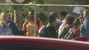 Students are seen leaving Serrano High School in Phelan on Nov. 17, 2017, jsut as outrage over some students making racist gestures and statements as shook the campus. (Credit: KTLA)