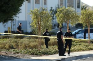 Fontana police investigate the scene of a suspected murder-suicide at a logistics company in Fontana on Dec. 29, 2017. (Credit: Stan Lim, San Bernardino Sun / SCNG)
