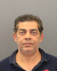 Adel Rezkallaa, 46, is seen in a booking photo released by the Orange County District Attorney's Office on Dec. 19, 2017.