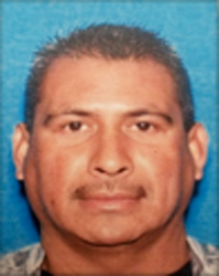 Pablo Cesar Cartagena is seen in a driver's license photo released Dec. 1, 2017, by the Los Angeles Police Department.