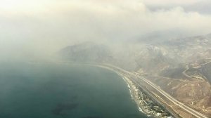 Smoke from the Thomas fire burning in Ventura County fans out across the Pacific Ocean on Dec. 7, 2017. (Credit: KTLA)