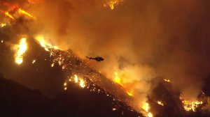 A wind-driven brush fire was burning out-of-control in the Santa Paula area on Dec. 4, 2017. (Credit: KTLA) 