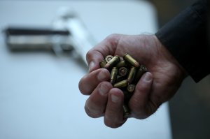 A San Francisco police officer holds a handful of ammunition that was surrendered during a gun buyback event on August 8, 2013 in San Francisco, California. Dozens of guns were turned in during a one-day gun buyback event in San Francisco's Mission District put on by San Francisco city officials. In hopes of reducing violence in the area, $100 was given for each working gun that was turned in and $200 was given for assault rifles. (Photo by Justin Sullivan/Getty Images)