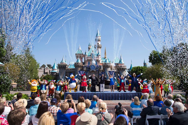 In this handout photo provided by Disney parks, Mickey Mouse and his friends celebrate the 60th anniversary of Disneyland park during a ceremony at Sleeping Beauty Castle at Fantastyland on July 17, 2015, in Anaheim. (Credit: Paul Hiffmeyer/Disneyland Resort via Getty Images)