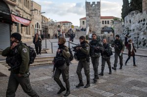 Members of the Israeli Border Police patrol through the Old City on Dec. 7, 2017, in Jerusalem. (Credit: Chris McGrath / Getty Images)