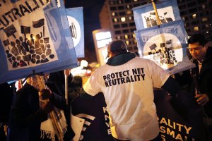 About 60 demonstrators gather outside of the 31st Annual Chairman's Dinner to show their support for net neutrality at the Washington Hilton December 7, 2017 in Washington, United States. (Credit: Chip Somodevilla/Getty Images)