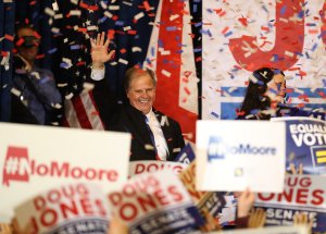 Democratic U.S. Senator elect Doug Jones greets supporters during his election night gathering the Sheraton Hotel on December 12, 2017 in Birmingham, Alabama. (Credit: Justin Sullivan/Getty Images)