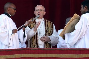 Pope Francis delivers his Christmas Urbi Et Orbi blessing from the central balcony of St. Peter's Basilica on December 25, 2017 in Vatican City, Vatican. (Credit: Franco Origlia/Getty Images)