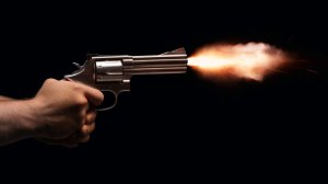 A revolver is fired. (Credit: BooostedAWD / iStock /Getty Images Plus)