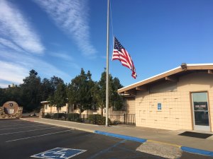 A half-staff flag is seen at Cal Fire's El Cajon station after a firefighter died in the Thomas Fire on Dec. 14, 2017. (Credit: Cal Fire)