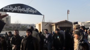 People demonstrate outside the offices of the Al-Qaeda-linked Islamic State of Iraq and the Levant, demanding that they stop fighting with the rebels, on Jan. 6, 2014, in the northern Syrian city of Aleppo. (Credit: MOHAMMED WESAM/AFP/Getty Images)