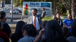 Olu K. Orange, an attorney representing teachers and students, announces a lawsuit attempting to prevent a construction project adjacent to Palms Elementary School, naming concerns such as toxic dust and noise that would distract hearing-impaired students, on Dec. 15, 2017. (Credit: Allen J. Schaben / Los Angeles Times)