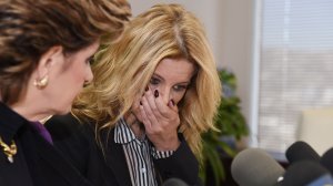 Summer Zervos, who previously accused President Donald Trump of sexually assaulting her, speaks at a press conference with attorney Gloria Allred at Allred's office in Los Angeles Nov. 11, 2016. Allred on Friday called on Trump to promise not to file a complaint against those who accused him of abusive sexual behavior, waving the threat of counter-prosecution. (Credit: Robyn Beck/AFP/Getty Images)