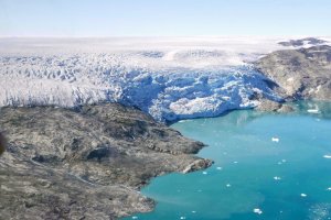 Ice flows from Helheim Glacier into Sermilik Fjord, in eastern Greenland. (Credit: Christian Steib/CNN)