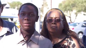 Hit-and-run victim Gloria Eaton Breaux's son, Anthony, left, and mother-in-law, Gloria, appear at a press conference in Leimert Park on Dec. 29, 2017. (Credit: KTLA)