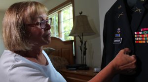 Transgender Retired U.S. Army Colonel Sheri Swokowski prepares her uniform on July 1, 2016, at her home in DeForest, Wisconsin. (Credit: Derek Henkle/AFP/Getty Images)