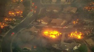 Several homes destroyed in the Thomas Fire are seen on Dec. 5, 2017. (Credit: KTLA)