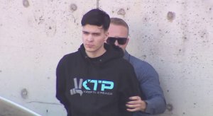 A person is taken into custody in connection with the Blaze Bernstein homicide investigation on Jan. 12, 2018. (Credit: KTLA)