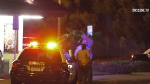 Deputies from the Los Angeles County Sheriff's Department investigate the scene where a 3-year-old boy was shot dead on Jan. 20, 2018. (Credit: OnScene.TV)
