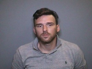 Nicholas Raymond Mauro of Santa Ana is seen in this booking photo provided by the Orange County District Attorney's Office on Jan. 3, 2018.