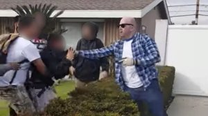 Cellphone video recorded by a witness shows an altercation between an off-duty LAPD officer, right, and teens in Anaheim on Feb. 22, 2017.