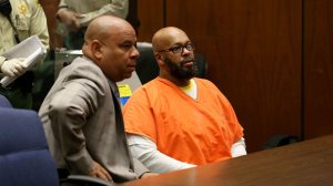 Attorney Matthew Fletcher, left, who previously represented Marion "Suge" Knight, right, during his ongoing murder case, was arrested Thursday. Prosecutors previously alleged in court filings that Fletcher, Knight and others engaged in possible witness tampering and bribery. (Credit: Irfan Khan / Los Angeles Times)