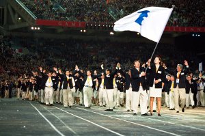 The two Korean Olympic teams walk round together under the same flag in a gesture of reconciliation during the Opening Ceremony of the Sydney 2000 Olympic Games at the Olympic Stadium in Homebush Bay, Sydney, Australia. (Credit: Jed Jacobsohn /Allsport)