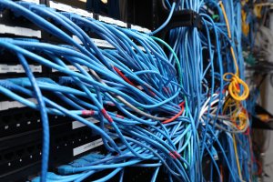 Network cables are plugged in a server room on Nov. 10, 2014, in New York City. (Credit: Michael Bocchieri / Getty Images)