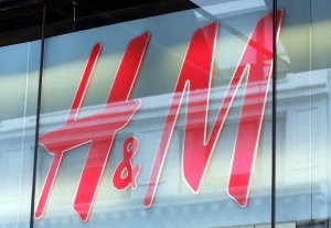 An H&M sign hangs in a window on April 7, 2005 in Chicago. (Credit: Tim Boyle/Getty)