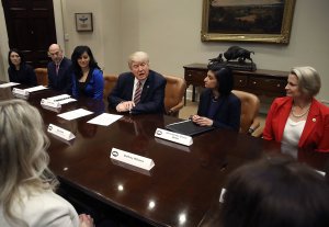 President Donald Trump speaks to participants of a women in healthcare panel hosted by Centers for Medicare and Medicaid Services head Seema Vermain, second from right, in the Roosevelt Room at the White House, March 22, 2017. (Credit: Mark Wilson / Getty Images)