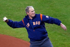 George W. Bush throws out the ceremonial first pitch before game five of the 2017 World Series between the Houston Astros and the Los Angeles Dodgers at Minute Maid Park on Oct. 29, 2017 in Houston, Texas. (Credit: Bob Levey/Getty Images)