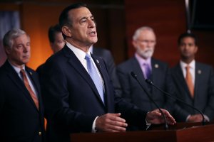 Rep. Darryll Issa is joined by more than a dozen Republican members of Congress as he speaks during a news conference about the Deferred Action for Childhood Arrivals (DACA) program at the U.S. Capitol on Nov. 9, 2017. (Credit: Chip Somodevilla / Getty Images)