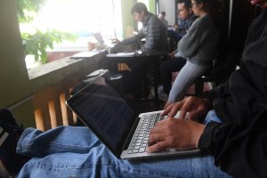 This picture taken on Dec. 6, 2017, shows people using laptops at a coffee shop in downtown Hanoi, Vietnam. (Credit: Hoang Dinh Nam / AFP / Getty Images)