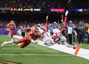 Mack Wilson #30 of the Alabama Crimson Tide scores a touchdown on an interception as Kelly Bryant #2 of the Clemson Tigers defends in the second half of the AllState Sugar Bowl at the Mercedes-Benz Superdome on January 1, 2018 in New Orleans, Louisiana. (Credit: Tom Pennington/Getty Images)