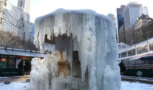  The frozen Josephine Shaw Lowell Memorial Fountain located at Bryant Park in New York is viewed on January 2, 2018. (Credit: TIMOTHY A. CLARY/AFP/Getty Images)