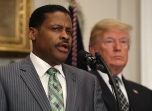 Isaac Newton Farris, Jr., left, speaks before President Donald Trump signed a proclamation to honor Martin Luther King, Jr. day, in the Roosevelt Room at the White House, on Jan. 12, 2018. (Credit: Mark Wilson / Getty Images)