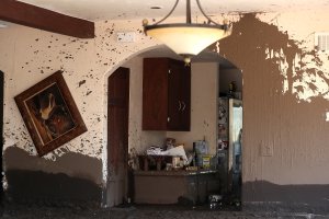 Mud fills a Montecito home that was destroyed by a mudslide, Jan. 12, 2018. (Credit: Justin Sullivan / Getty Images)