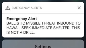 A screen shot taken by Hawaiian citizen Alison Teal shows the screen of her mobile phone with an alert text message sent to all Hawaiian citizens on Jan. 13, 2018. (Credit: ALISON TEAL/AFP/Getty Images)