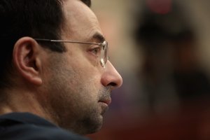 Larry Nassar listens to victim impact statements on January 17, 2018 during his sentencing hearing after being accused of molesting more than 100 girls while he was a physician for USA Gymnastics and Michigan State University. (Credit: Scott Olson/Getty Images)